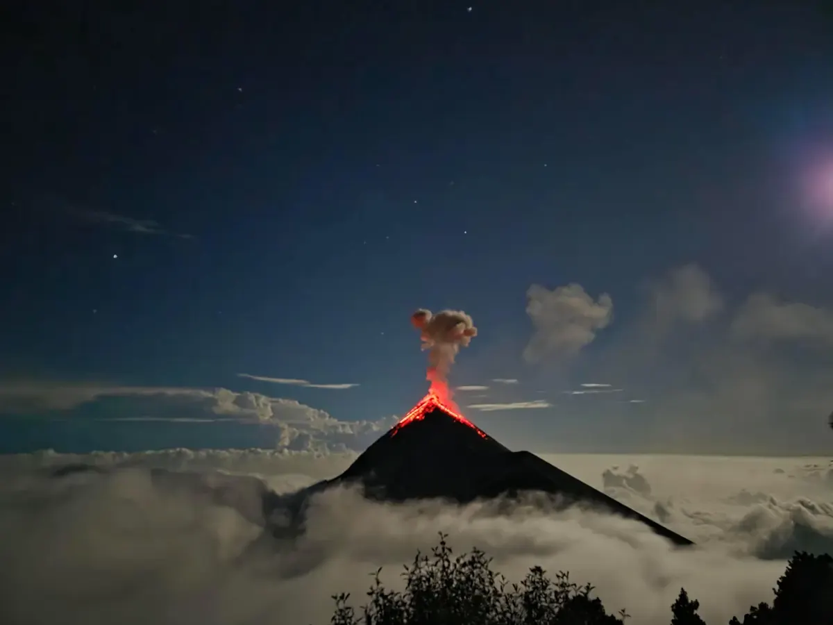 Guatemala volcano above a sea of clouds